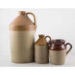Copper coal skuttle, bed warming pan with other stoneware jugs and flasks.