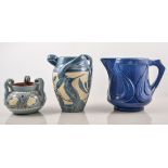 Barum blue glazed jug, large ashtray, three-handled vase decorated with heart motifs,