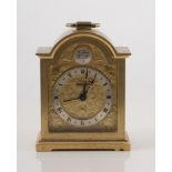 Small brass cased Swiza clock.