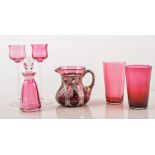 A collection of cranberry glass, hand bell 28cms, beakers, etc., (11).