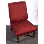 Victorian upholstered nursing chair, square back, turned and stained wood legs.