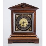 Edwardian oak mantel clock, architectural form, brass dial with cast spandrels,