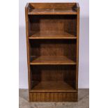 A small oak open bookcase, three shelves, plinth base, width 46cm.