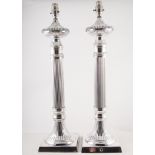 Pair of silver plated reeded table lamps, on square bases, 60cm high.