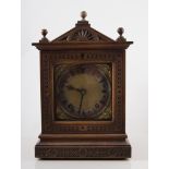 A Continental beech cased mantel clock, architectural form, brass dial, the movement stamped W & H,