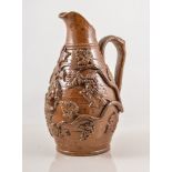 Wine ewer, 21cm, reproduction Pratt ware in brown glaze decorated with fruiting vine.