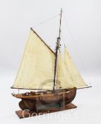 A 1930's apprentice scratch built shipbuilder's model of the cutter, 'Edith', on mahogany stand, H.