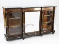 A Victorian ebonised and burrwood side cabinet, with central mirrored door flanked by two glazed