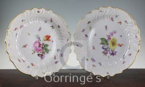 A pair of Meissen flower painted dishes, late 19th / early 20th century, diam. 35cm