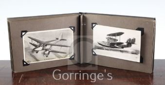 Three Edwardian postcard albums, mostly English topography, including villages, villagers and