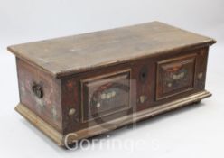 An Austrian painted pine marriage chest, with two panels decorated with flowers in baskets, W.4ft