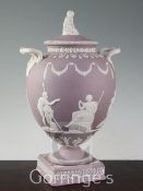 A Wedgwood lilac jasper twin handled vase and cover, early 20th century, decorated with white sprigs