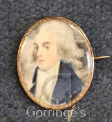 Early 19th century English Schooloil on ivory,Miniature of a gentleman wearing a blue coat,1.7 x 1.