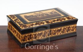 A Victorian Tunbridge ware casket, the lid decorated with a view of Herstmonceux Castle, within a