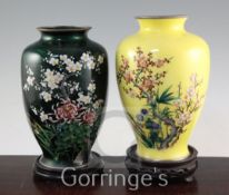 Two Japanese cloisonne enamel ovoid vases, mid 20th century, both 24.5cm, some damage, wood stands