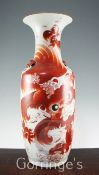 A Chinese iron red painted lion-dog baluster vase, late 19th / early 20th century, 59.5cm