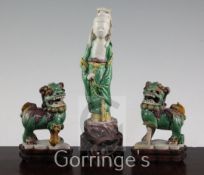 Three Chinese Sancai glazed biscuit figures, early 18th century, the first modelled as He Xiangu