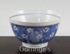 A Chinese blue and white 'prunus and cracked ice' bowl, Chenghua six character mark, Kangxi