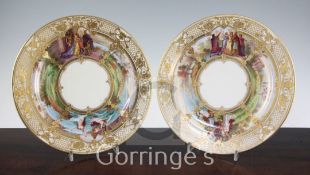 A pair of Czechoslovakian porcelain cabinet plates, 1920's, each finely hand painted with figure