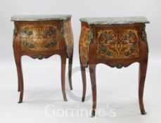 A pair of French kingwood and marquetry commodes, with green marble tops and two drawers, W.1ft