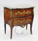 A Louis XVI marble topped and ormolu mounted serpentine commode, fitted with two drawers, on