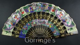 A Chinese applique work painted leaf and gilt decorated black lacquer fan, 19th century, with gilt