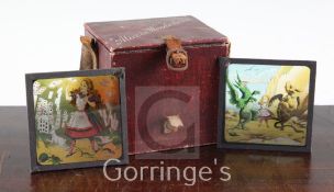 A set of twenty four Alice in Wonderland magic lantern slides, in original box