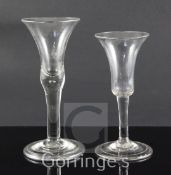 Two drinking glasses, c.1740, the first with a funnel shaped bowl, diamond point engraved