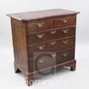 A George II red walnut small chest, of two short and three long drawers, W.2ft 10in.