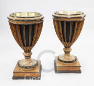 A pair of simulated burrwood and ebonised urns, with metal liners, H.2ft 9in.