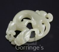 A Chinese celadon jade carving of a chi-dragon biting a sprig of lingzhi fungus, Qing dynasty, 6.