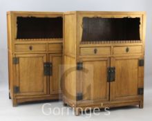 A pair of 19th century Chinese hardwood cabinets, with open superstructure above two drawers and a
