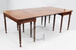 A George IV mahogany extending dining table, with ropetwist legs and turned ball feet, W.3ft 8.5in.,