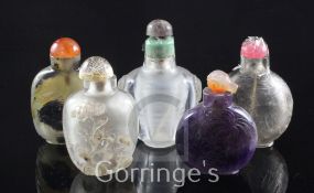 Five Chinese quartz snuff bottles, late 19th / 20th century, the first in smoky quartz well hollowed