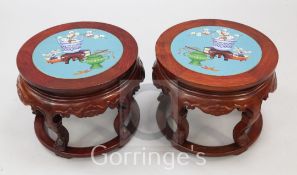 A pair of Chinese hardwood and cloisonne enamel stands or low tables, the cloisonne panels decorated