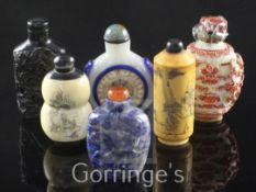 Six Chinese snuff bottles, in various materials, 19th / 20th century, the first moulded in porcelain