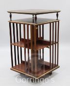 A late 19th century French Bibliotheque Terquem brass bound mahogany two tier revolving bookcase,