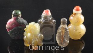 Five Chinese quartz snuff bottles, 19th / 20th century of double gourd, lion-dog, leaf and carved