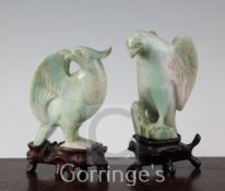 Two Chinese jadeite models of birds, 20th century, 10.4cm and 11cm, wood stands