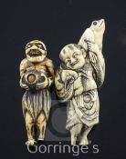 Two Japanese ivory netsuke of Sennin, the first in the form of Gama Sennin holding a toad upon his