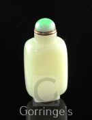 A Chinese pale celadon jade snuff bottle, 1800-1900, of oblong form, well hollowed on an oblong