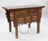 A Chinese elm side table, with two drawers, W.3ft 10in.