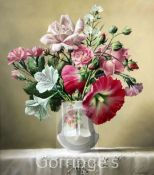 Pieter Wagemans (1879-1955)oil on panel,Roses and hollyhocks,signed and dated MMV,15 x 13in.