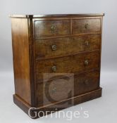 A Victorian plum pudding mahogany chest, of two short and three long drawers, W.3ft 8in.