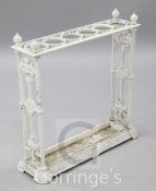 A late Victorian white painted cast iron stick stand, 2ft