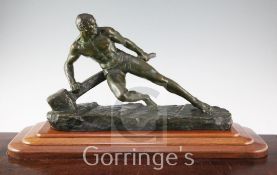 Pierre Le Faguays. A patinated bronze figure of a man working a tiller, marked P. Le Faguays, and
