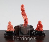 Three Chinese coral figures, two of the seated figure of Buddha and the third of a lady, wood