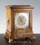 A late Victorian golden oak bracket clock, with square brass dial, W & H movement, 13in.