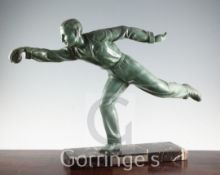 An Art Deco bronzed spelter figure of boule player, on marble plinth, 17in.