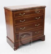 An Edwardian satinwood banded mahogany chest, of four long drawers, W.3ft
